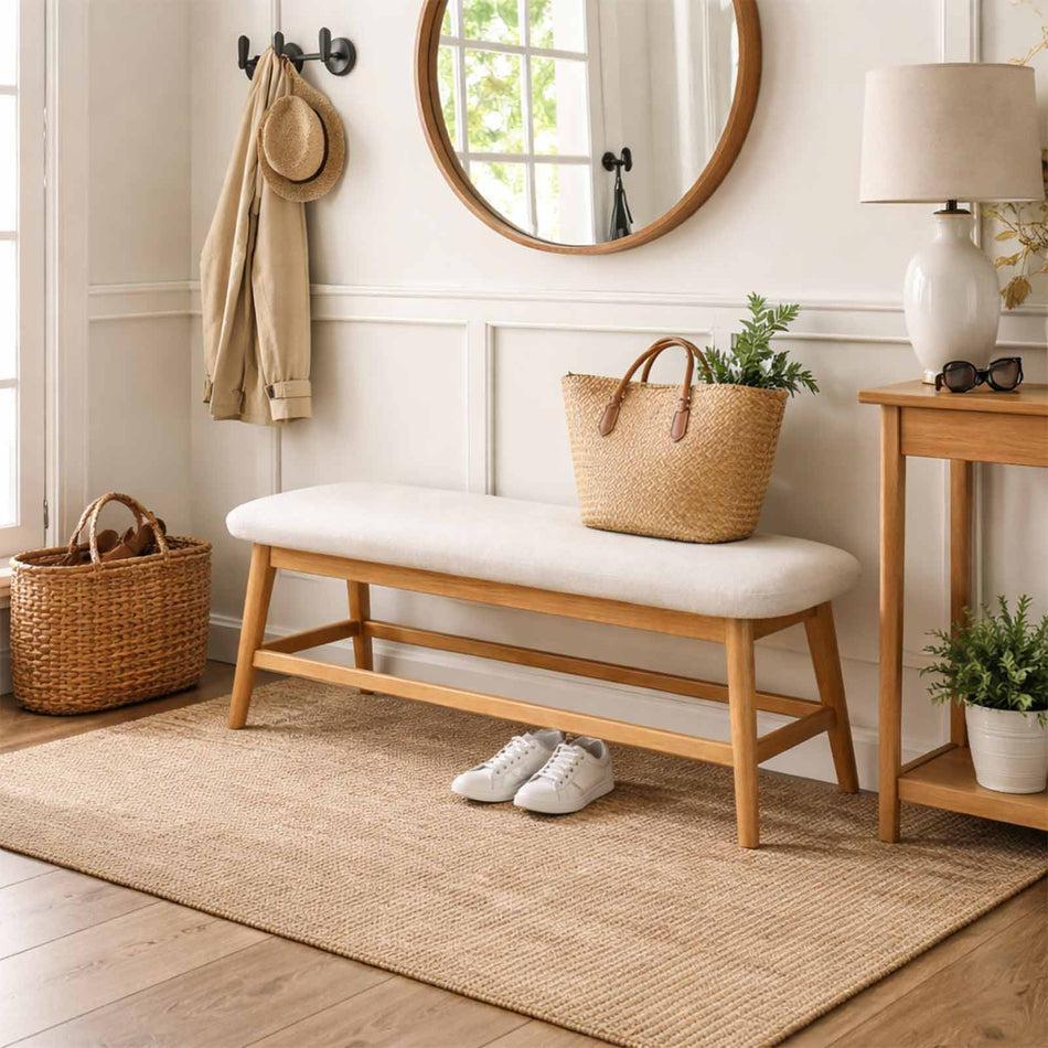 Upholstered wooden bench with tapered legs