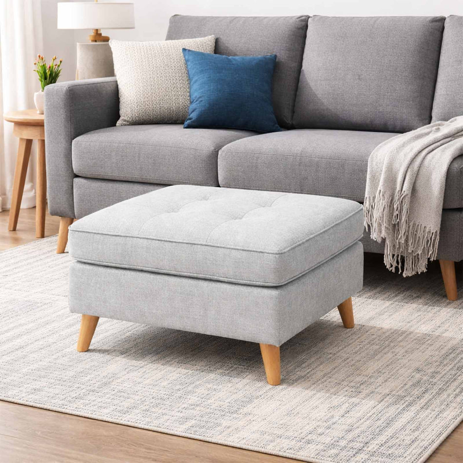 Tufted cushion 0ttoman with wooden legs