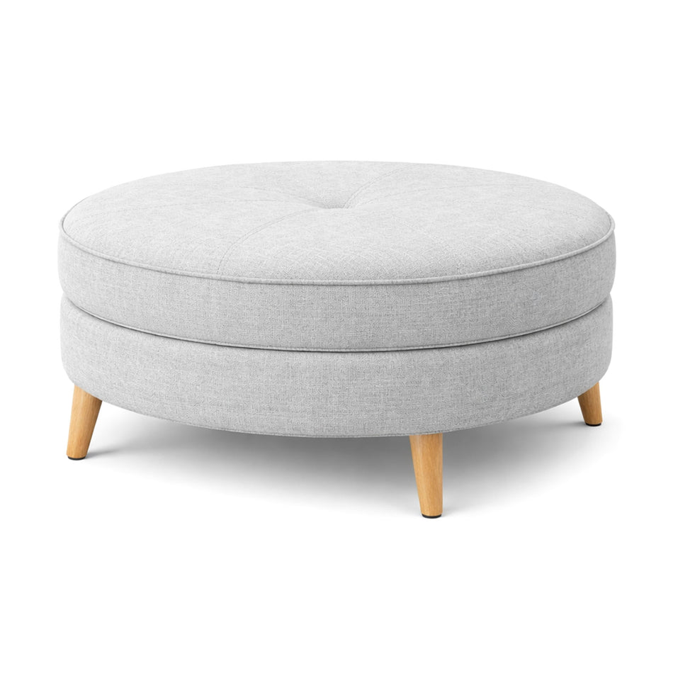 Round button-detailed ottoman with wooden legs
