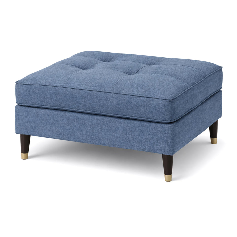 Tailored cushion ottoman with tapered legs
