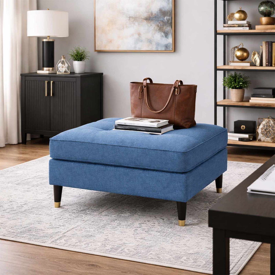 Tailored cushion ottoman with tapered legs