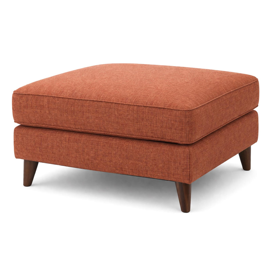 Cushioned ottoman with tapered wooden legs