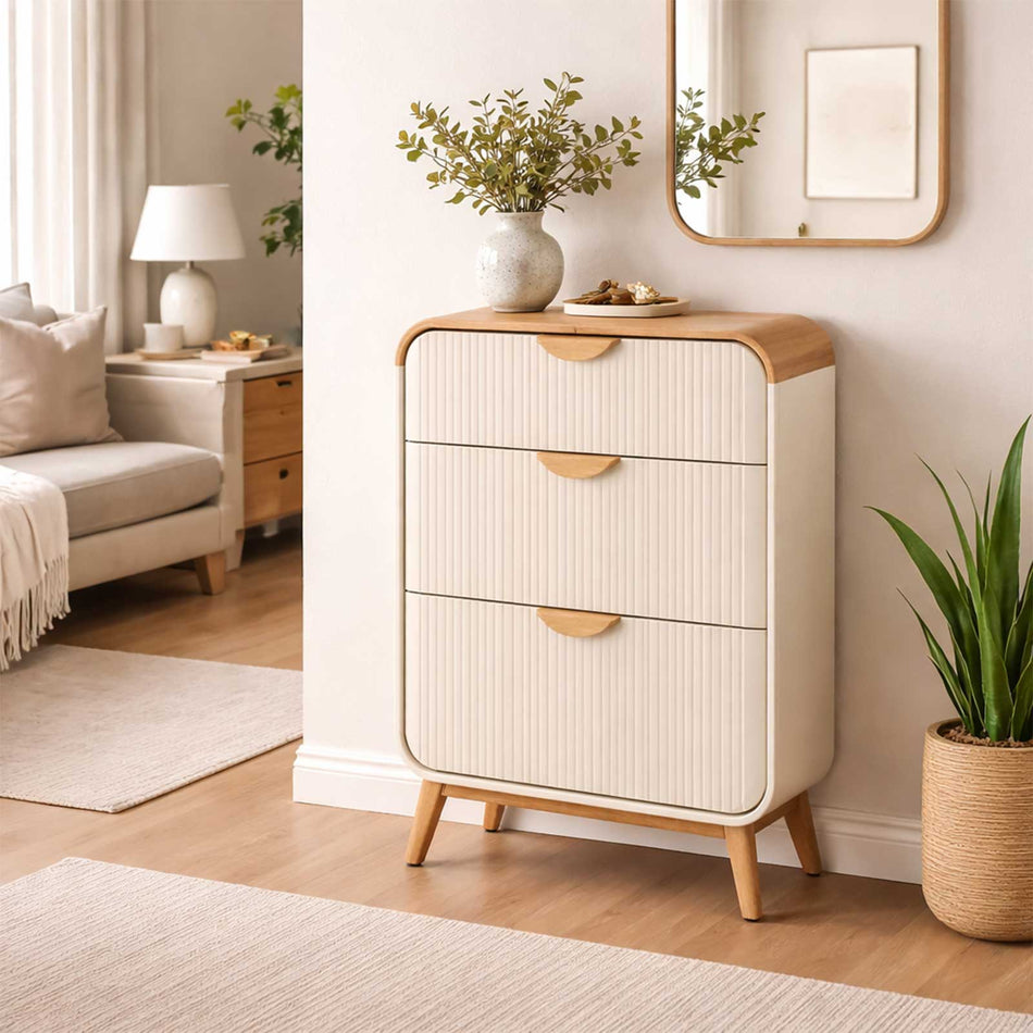 Rounded edge cabinet with ribbed front